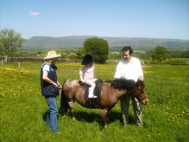 Emily pony ride with Mickey