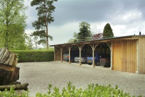 Car ports and workshop at The Burrells